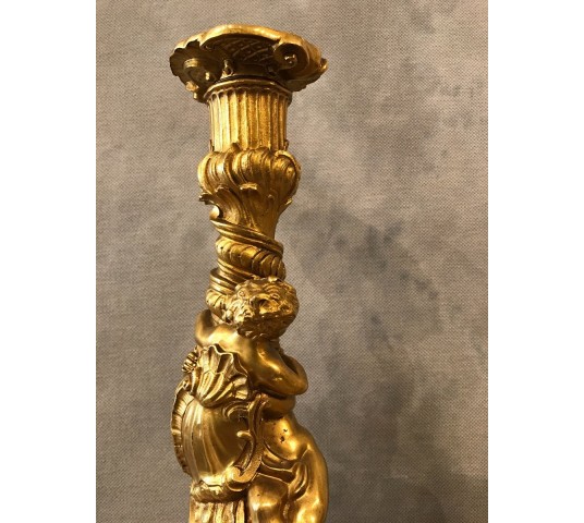 Ravant pair of torches of time 18th Louis XV in gilded bronze