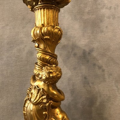 Ravant pair of torches of time 18th Louis XV in gilded bronze