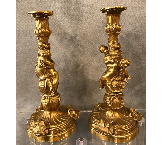 Ravant pair of torches of time 18th Louis XV in gilded bronze