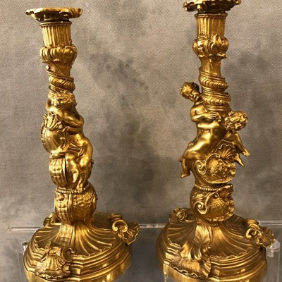 Ravant pair of torches of time 18th Louis XV in gilded bronze