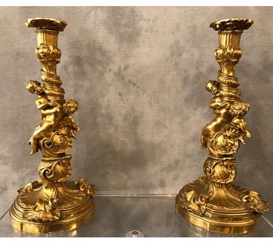 Ravant pair of torches of time 18th Louis XV in gilded bronze