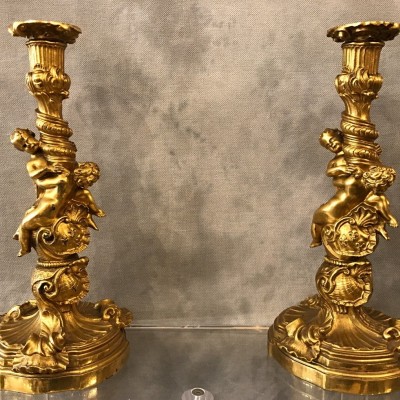 Ravant pair of torches of time 18th Louis XV in gilded bronze