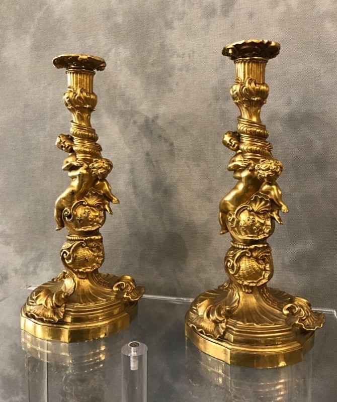 Ravant pair of torches of time 18th Louis XV in gilded bronze