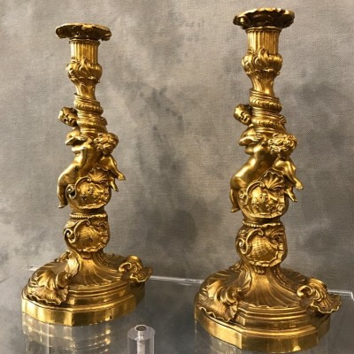 Ravant pair of torches of time 18th Louis XV in gilded bronze