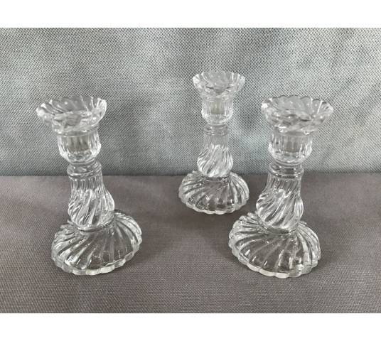 Trois petits bougeoirs en verre pressé vers 1900