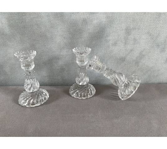 Trois petits bougeoirs en verre pressé vers 1900