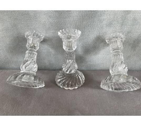 Trois petits bougeoirs en verre pressé vers 1900