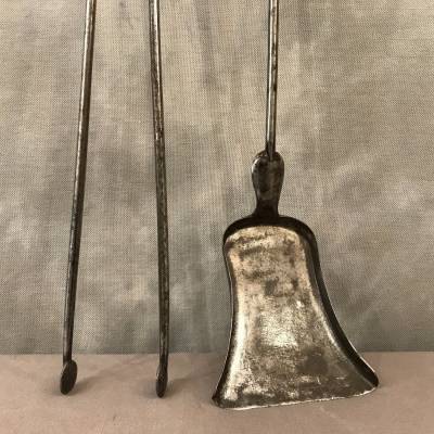 Set of a 19th century iron and bronze shovel and pliers