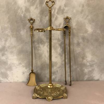 Servant of ancient fireplace in bronze and vintage brass - 19th century.