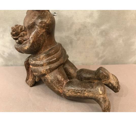 Elégant petit amour en bois sculpté d'époque 18 ème